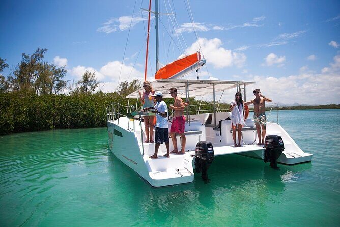 All inclusive CATAMARAN with BBQ : Ile aux cerf & GRSE waterfall - Port Louis Morning: Private Pickup and Getting Set for a Full Day