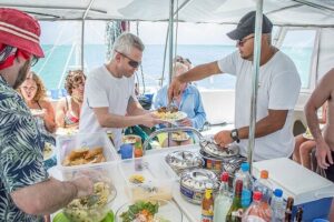 All inclusive CATAMARAN with BBQ : Ile aux cerf & GRSE waterfall - On the Water: BBQ, Continuous Drinks, and the On-Board Vibe