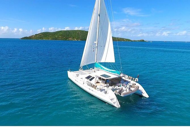 Catamaran Adventure Full Day: Ile aux cerfs,GRSE Waterfall,Snorkeling &BBQ Lunch - Boat crowd levels, music, and how that affects your day