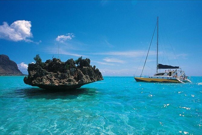 Catamaran Cruise to Ile Aux Bénitiers: Dolphin watch, Crystal Rock & Transfer - From La Preneuse to Crystal Rock: snorkeling breaks and sea views