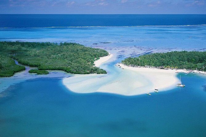 Catamaran to Ile aux Cerf with Parasailing, Tube Riding & Lunch - Parasailing at Ile aux Cerfs: The Big-View Moment