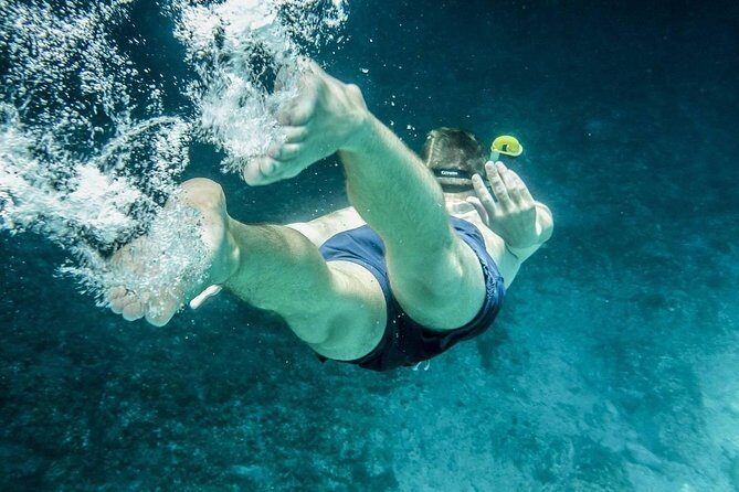 Catamaran to Ile aux Cerf with Parasailing, Tube Riding & Lunch - Tube Riding: Speed Fun With Serious Grip