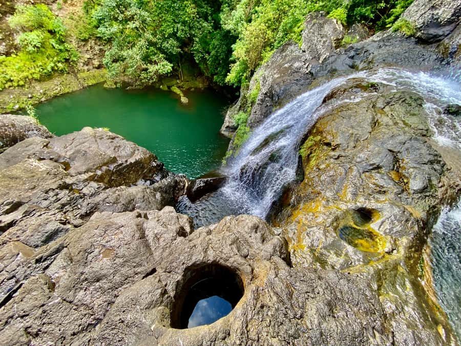 From Quatre Cocos: Tamarind Falls Hiking Day Trip - From hotel pickup to the trailhead: how the day starts