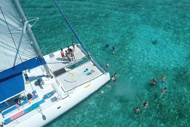 Full Day Catamaran Cruise on shared basis to Bénitiers Island - Ile aux Bénitiers: lagoon time, island visit, and snorkeling gear included
