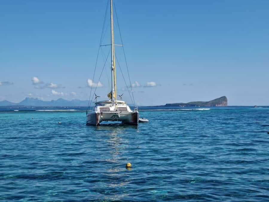 Grand Bay: Catamaran Cruise to Flat Island with BBQ Lunch - Cruising past Cap Malheureux, Péreybère, and Grand Baie