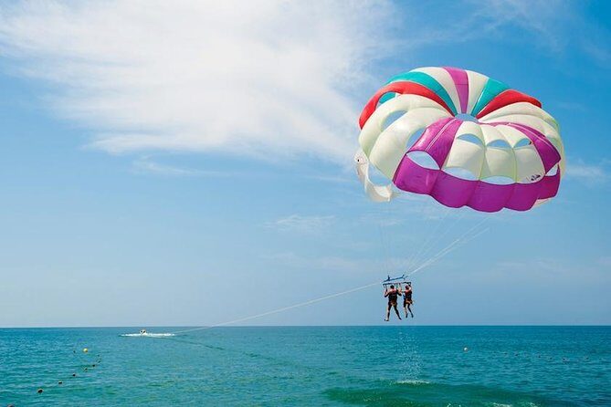Ile aux Cerf: Speed boat with Parasailing & Tube Riding and Lunch - Islet Margenie Lunch: Barbecue, Drinks, and Sega