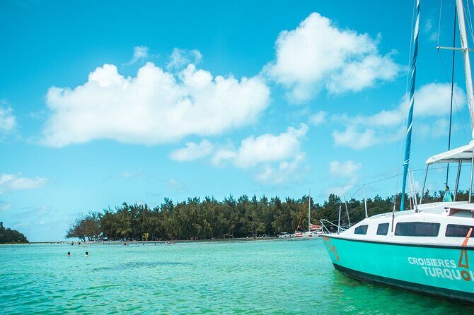 Mauritius : Full day All inclusive Ile aux cerfs Catamaran cruise - Dolphins, Steering Moments, and Those Unexpected Magic Minutes