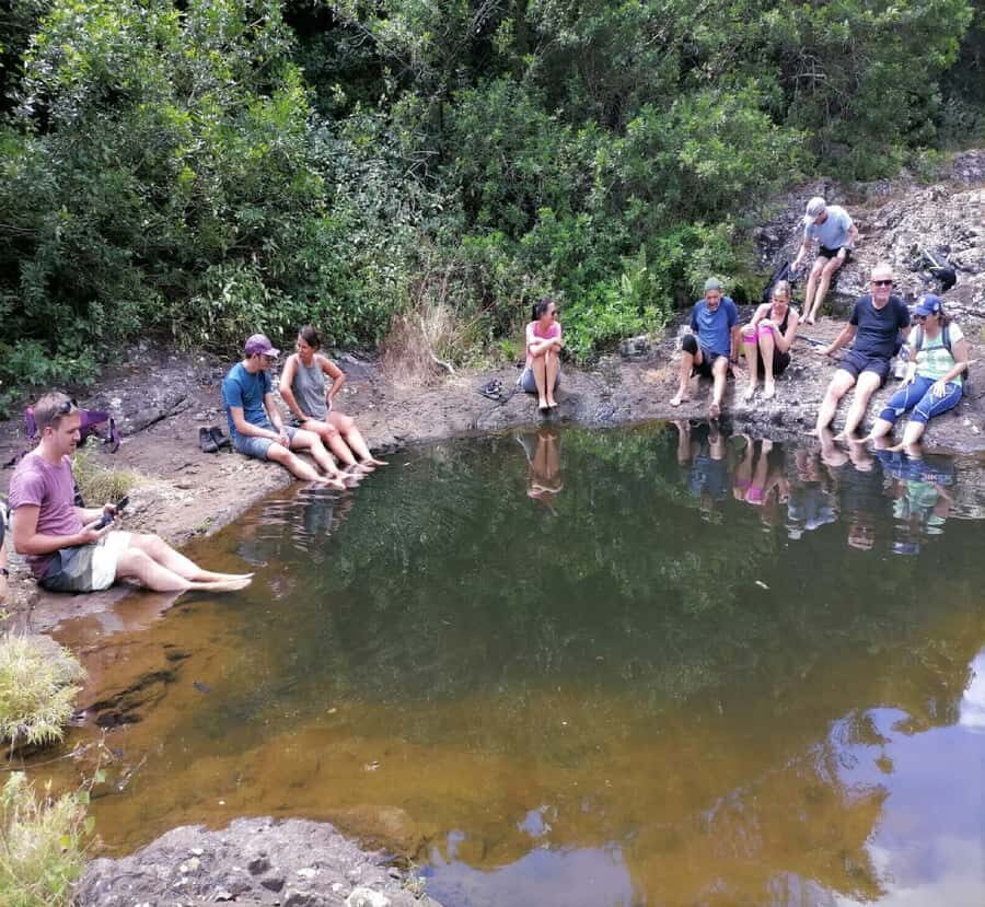 Mauritius: Tamarind Falls Guided Hike with Swim and Lunch - The mid-hike break with lunch and local snacks