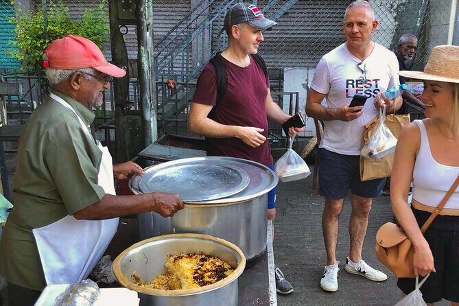 Port Louis Street Food and Cultural Walking Tour - Jummah Mosque stop: culture, architecture, and a samosa + gateaux pit stop