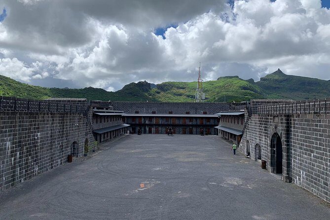 Private Guided Tour of Northern Mauritius with Shopping in Port Louis - Cap Malheureux red roof and the Coin de Mire photo angle