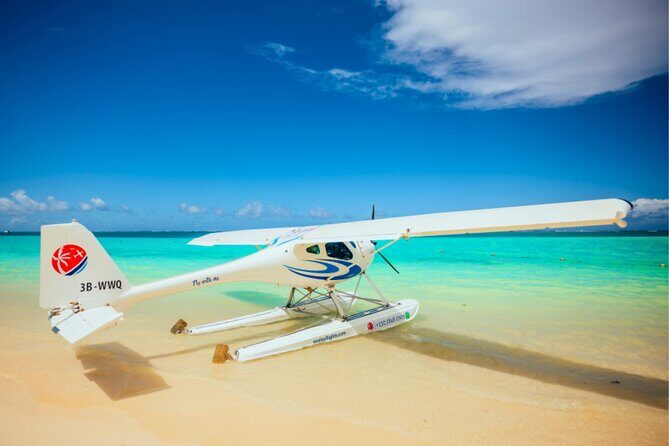 Seaplane Tours over the turquoise lagoon of the East of Mauritius - Île aux Cerfs from above: white sand, lagoon color, and a golf course